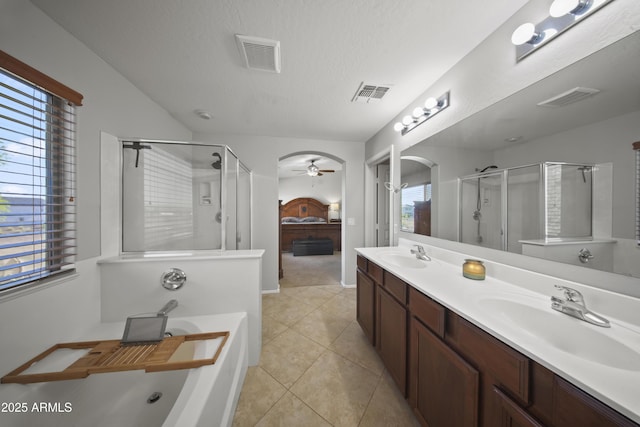 9719 W Heber Rd, Tolleson, AZ 85353 - bathroom with visible vents, a sink, and a stall shower