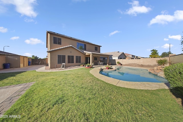 9719 W Heber Rd, Tolleson, AZ 85353 - view of swimming pool with a yard, a fenced in pool, a fenced backyard, and a patio area