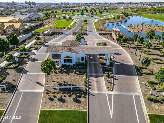 aerial view featuring a water view and a residential view