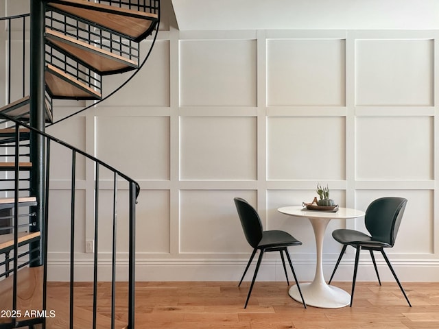 stairway featuring hardwood / wood-style floors