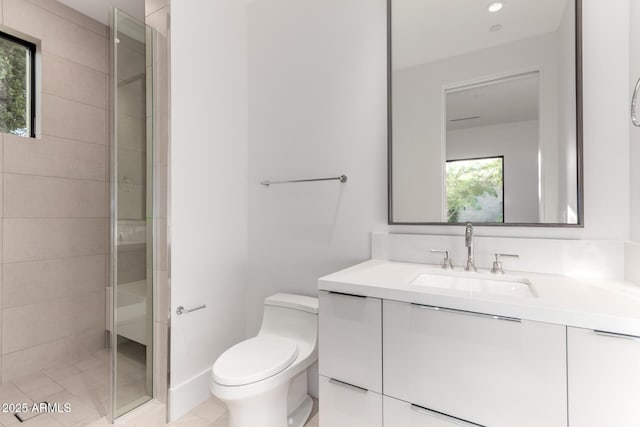 6970 E Joshua Tree Ln, Paradise Valley, AZ 85253 - full bathroom featuring vanity, a tile shower, toilet, and tile patterned flooring