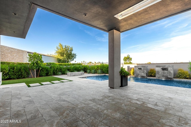 6970 E Joshua Tree Ln, Paradise Valley, AZ 85253 - outdoor pool featuring a patio area