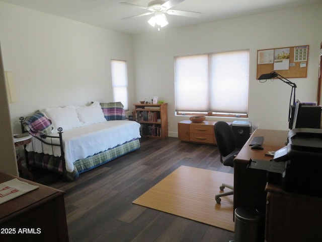 bedroom featuring ceiling fan and wood finished floors