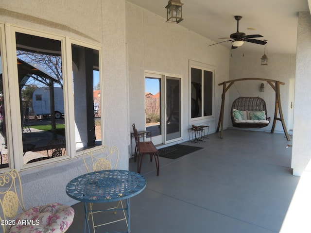 view of patio / terrace with a ceiling fan