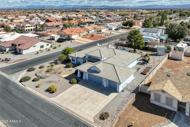 aerial view with a residential view and a mountain view