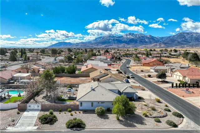 bird's eye view with a residential view and a mountain view