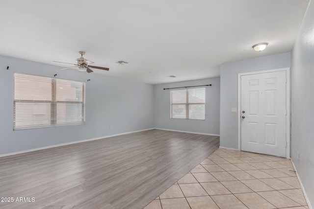 interior space featuring ceiling fan and light hardwood / wood-style flooring