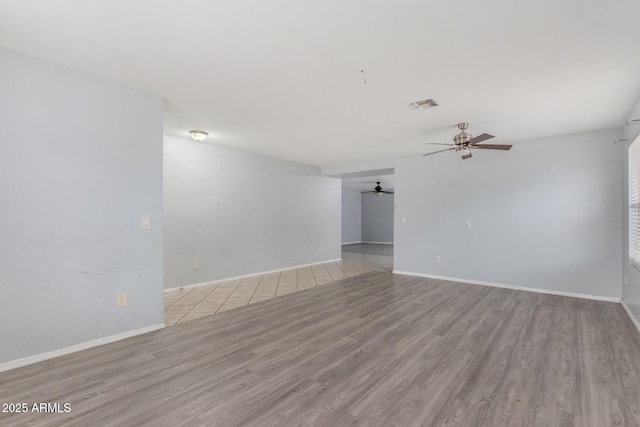 empty room with light hardwood / wood-style floors