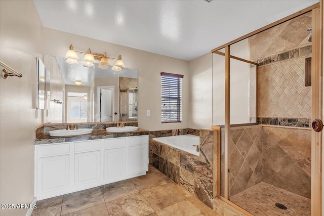 bathroom with vanity and plus walk in shower