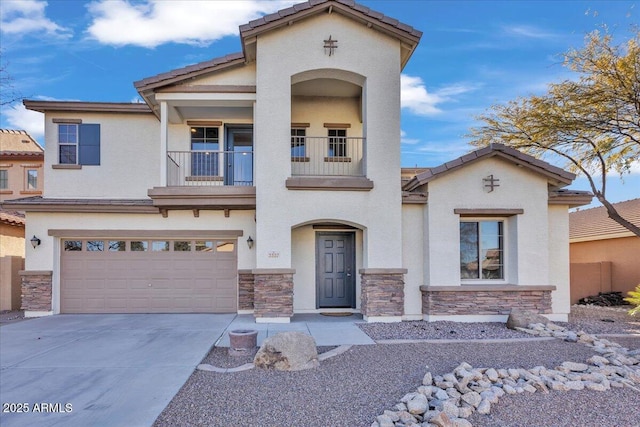 view of front of property with a garage and a balcony