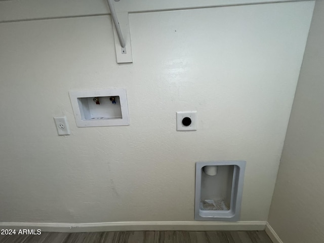 laundry area featuring washer hookup, hardwood / wood-style flooring, and electric dryer hookup