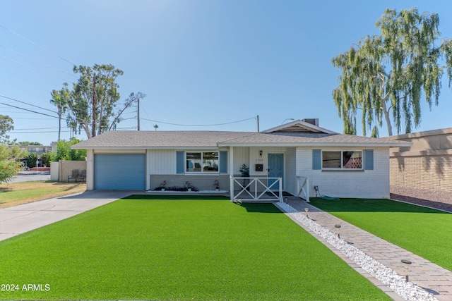 ranch-style home featuring an attached garage, brick siding, fence, concrete driveway, and a front lawn