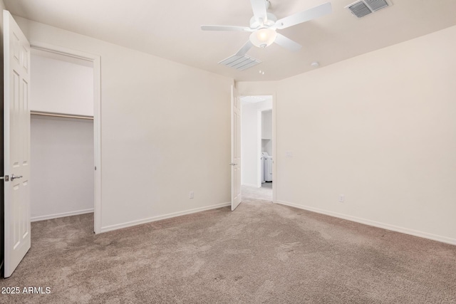 unfurnished bedroom with carpet, a closet, visible vents, ceiling fan, and baseboards