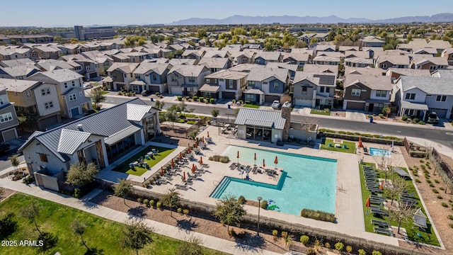 birds eye view of property featuring a mountain view and a residential view