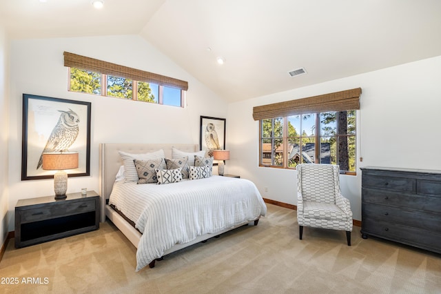 bedroom with high vaulted ceiling, multiple windows, visible vents, and carpet flooring