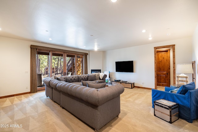 living room with light carpet, visible vents, baseboards, and recessed lighting