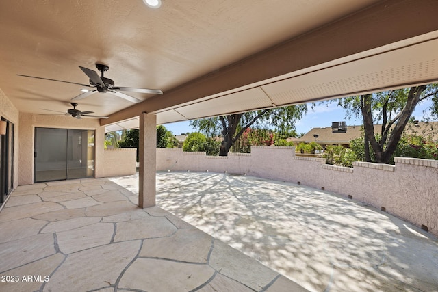 view of patio featuring ceiling fan