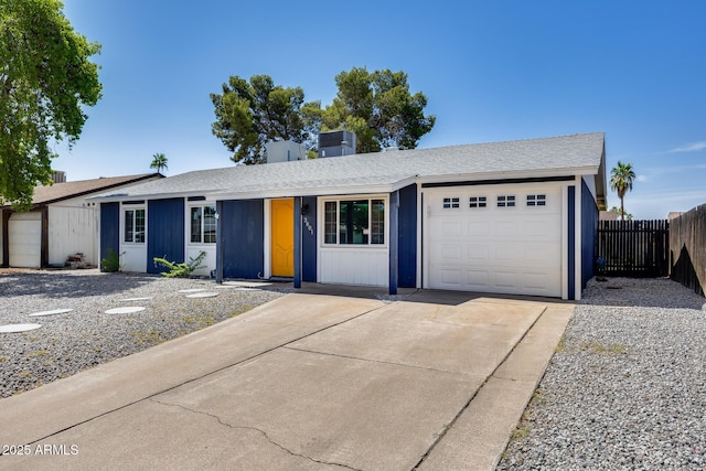 3801 E Captain Dreyfus Ave, Phoenix, AZ 85032 - single story home featuring a garage, concrete driveway, and roof with shingles