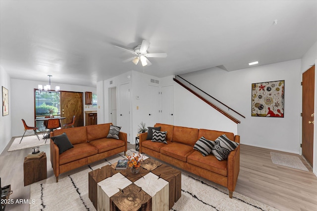 4630 N 68th St Unit 280, Scottsdale, AZ 85251 - living area with a chandelier, light wood finished floors, and ceiling fan
