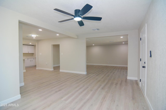 unfurnished room with light wood-style flooring, baseboards, visible vents, recessed lighting, and a ceiling fan