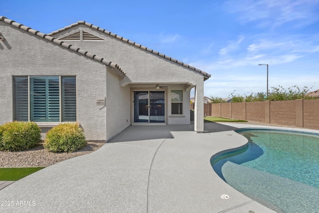 19203 W Jackson St, Buckeye, AZ 85326 - view of pool with a patio and a fenced backyard