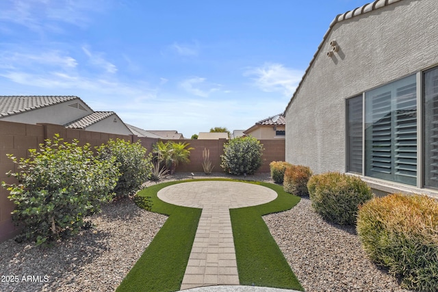 19203 W Jackson St, Buckeye, AZ 85326 - fenced backyard with a patio area