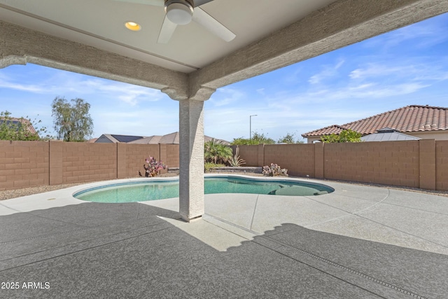 19203 W Jackson St, Buckeye, AZ 85326 - view of pool featuring a fenced backyard, a ceiling fan, and a patio area