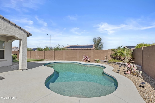 19203 W Jackson St, Buckeye, AZ 85326 - view of swimming pool with a fenced backyard and a patio