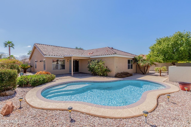 view of swimming pool with fence, a patio area, and a fenced in pool