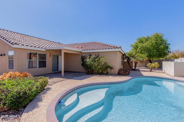 view of pool featuring a fenced in pool, a patio, and a fenced backyard