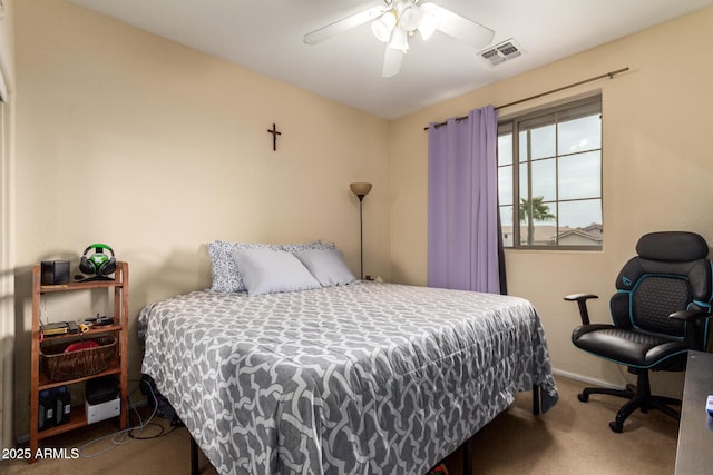 bedroom featuring carpet floors, a ceiling fan, visible vents, and baseboards