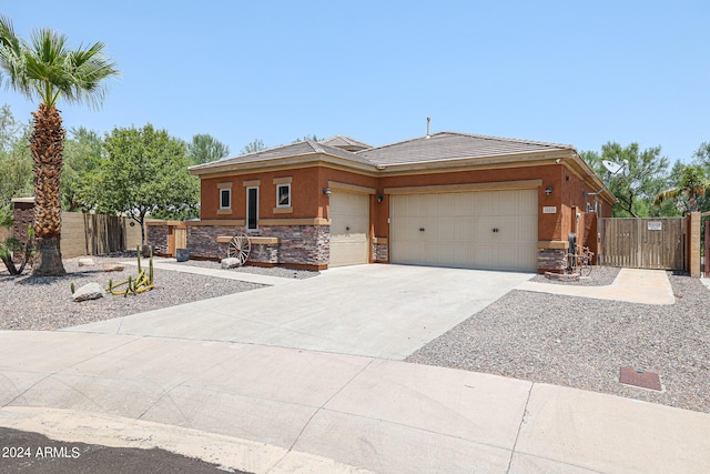 prairie-style house featuring a garage