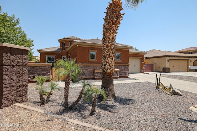 prairie-style house featuring a garage