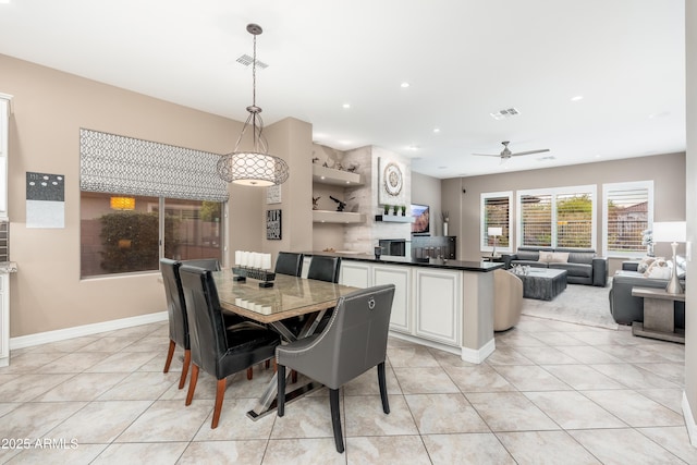 5428 E Windstone Trl, Cave Creek, AZ 85331 - dining room with light tile patterned floors, ceiling fan, recessed lighting, and baseboards