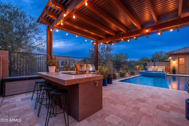 5428 E Windstone Trl, Cave Creek, AZ 85331 - fenced backyard with an outdoor bar, a patio area, and a pool with connected hot tub