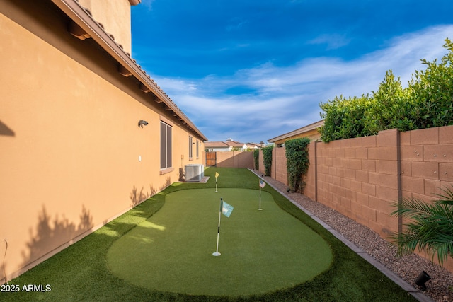5428 E Windstone Trl, Cave Creek, AZ 85331 - fenced backyard with a putting green and cooling unit