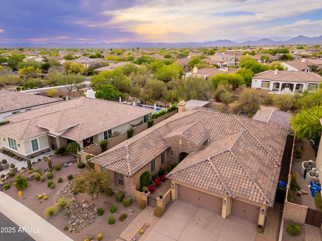 5428 E Windstone Trl, Cave Creek, AZ 85331 - aerial view at dusk of a residential view and a mountain view