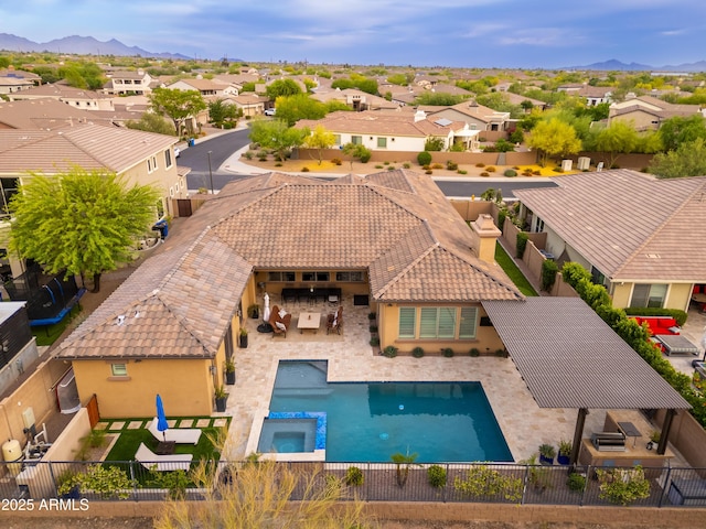 5428 E Windstone Trl, Cave Creek, AZ 85331 - view of swimming pool with a residential view, a fenced backyard, a pool with connected hot tub, and a mountain view