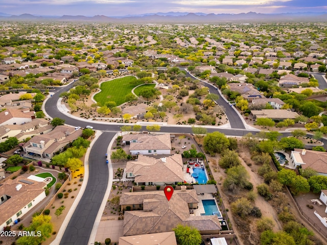5428 E Windstone Trl, Cave Creek, AZ 85331 - aerial perspective of suburban area with a mountainous background and a pool area