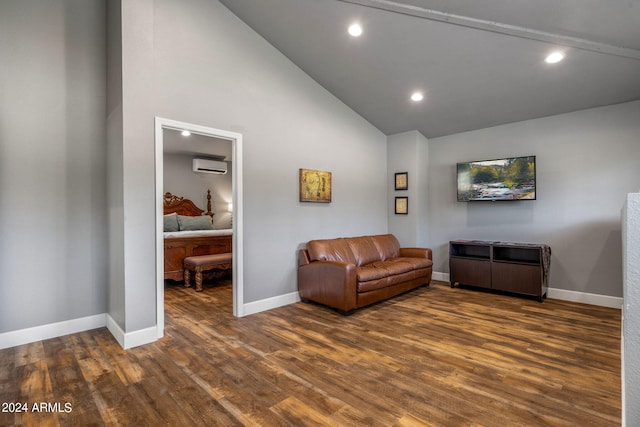 living room featuring high vaulted ceiling, a wall mounted air conditioner, and dark hardwood / wood-style floors