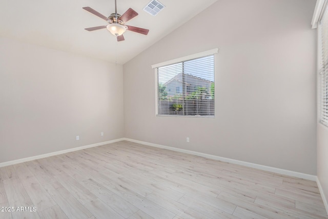 13020 W Highland Ave, Litchfield Park, AZ 85340 - spare room with light wood finished floors, ceiling fan, and high vaulted ceiling