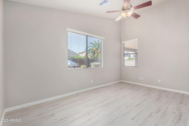 13020 W Highland Ave, Litchfield Park, AZ 85340 - unfurnished room with light wood-type flooring and ceiling fan