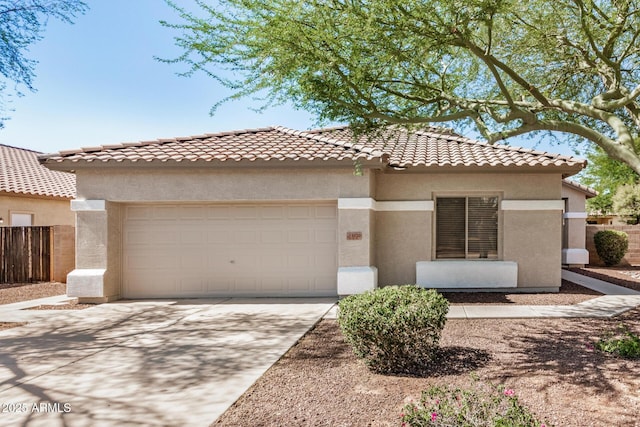 13020 W Highland Ave, Litchfield Park, AZ 85340 - view of front of house with an attached garage, stucco siding, driveway, and a tile roof