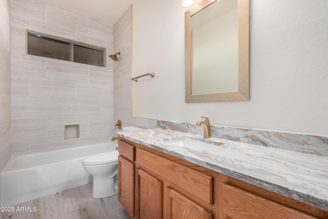 13020 W Highland Ave, Litchfield Park, AZ 85340 - bathroom featuring vanity, bathing tub / shower combination, and wood finished floors