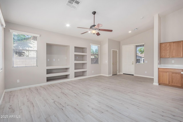 13020 W Highland Ave, Litchfield Park, AZ 85340 - unfurnished living room with built in features, light wood finished floors, ceiling fan, recessed lighting, and vaulted ceiling