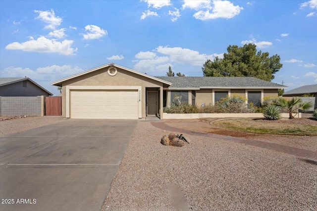 single story home with a garage