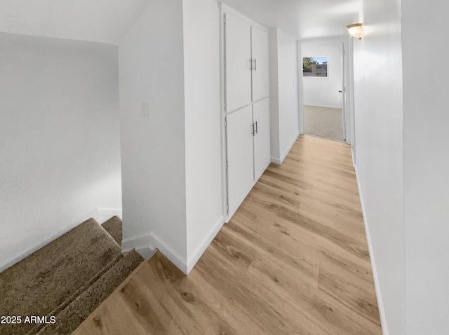 225 N Standage Unit 89, Mesa, AZ 85201 - hall with baseboards and light wood-style floors