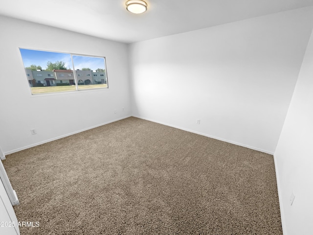 225 N Standage Unit 89, Mesa, AZ 85201 - unfurnished room featuring baseboards and carpet