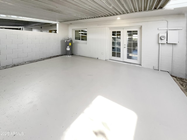 225 N Standage Unit 89, Mesa, AZ 85201 - view of patio with fence, french doors, and electric water heater