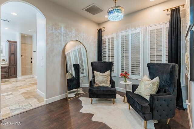 1409 E Dove Pl, Casa Grande, AZ 85122 - sitting room with arched walkways, baseboards, and recessed lighting